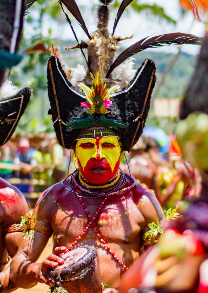 Traveling deep in the southern highlands of Papua New Guinea I found myself at this traditional festival. It was full of colour and celebration of culture. Different tribes across the region came dressed to represent their people. This man was a part of the Hulu tribe. It was interesting to see the vast difference’s of personalities across the different tribes. The Hulu tribe in particular was the most loud and aggressive of the tribes represented. I could feel the passion and love each tribe had for their people.